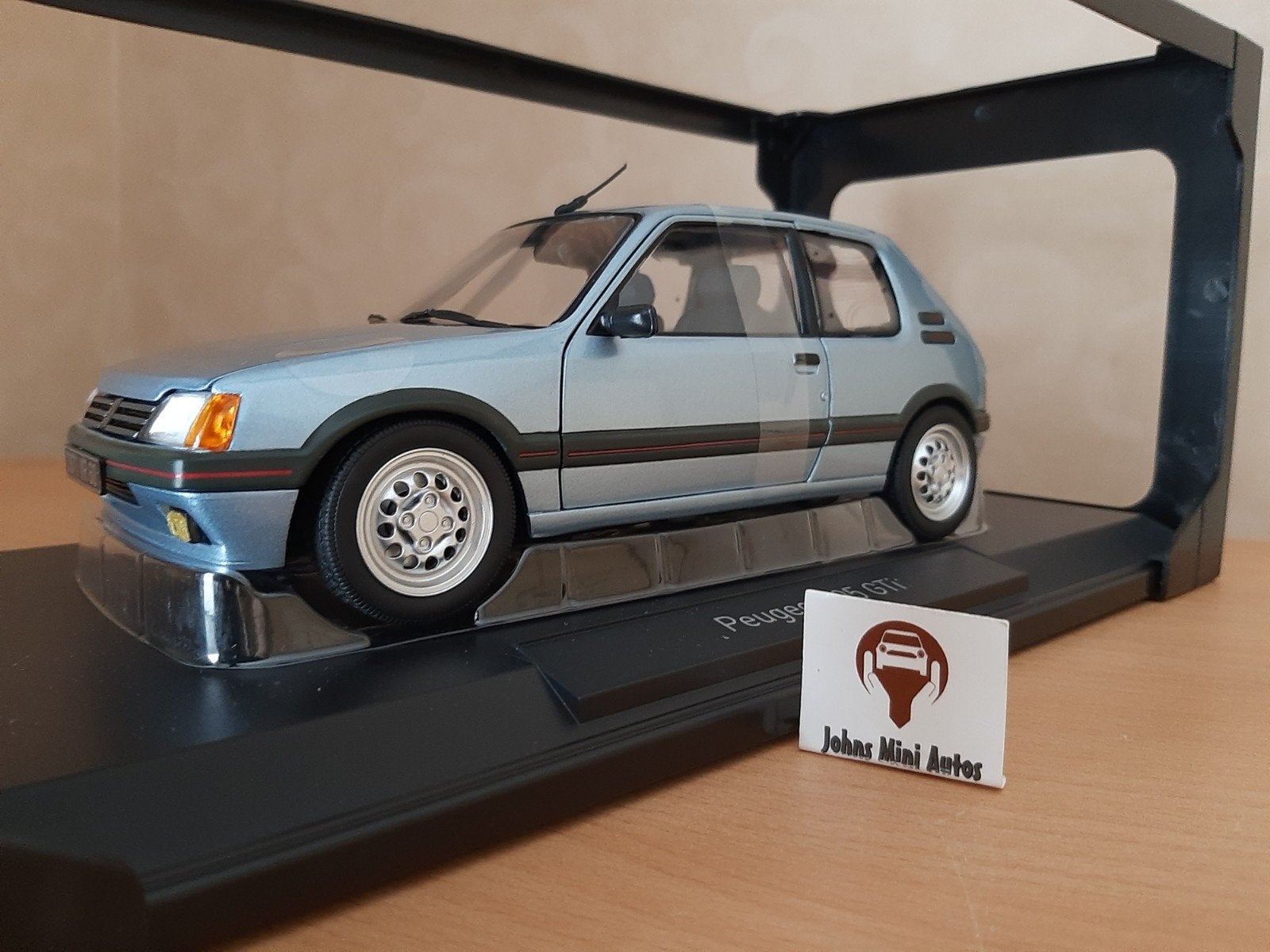 Peugeot 205 GTi 1.6 1988 in Topaze Blue van Norev 1:18