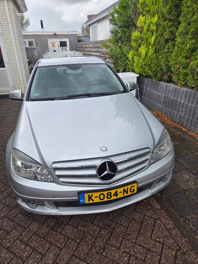 Mercedes-Benz C-Klasse 2.0 C200 CGI Sedan AUT 2010 Grijs, Auto's, Achterwielaandrijving, 1800 kg, Zwart, 4 cilinders