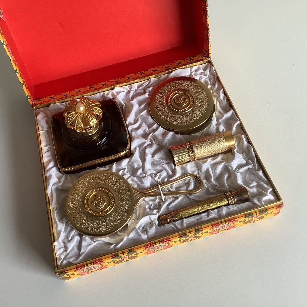 prachtige vintage Myrna Pons vanity set, Ophalen of Verzenden, Zo goed als nieuw, Parfumfles, Gevuld