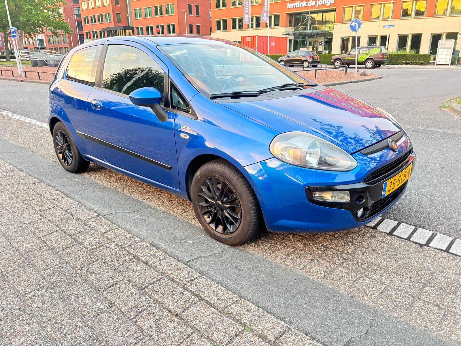 Fiat Punto EVO 1.3 Multijet  2. Eigenaar 2011, Auto's, Voorwielaandrijving, Stof, 4 cilinders, Origineel Nederlands