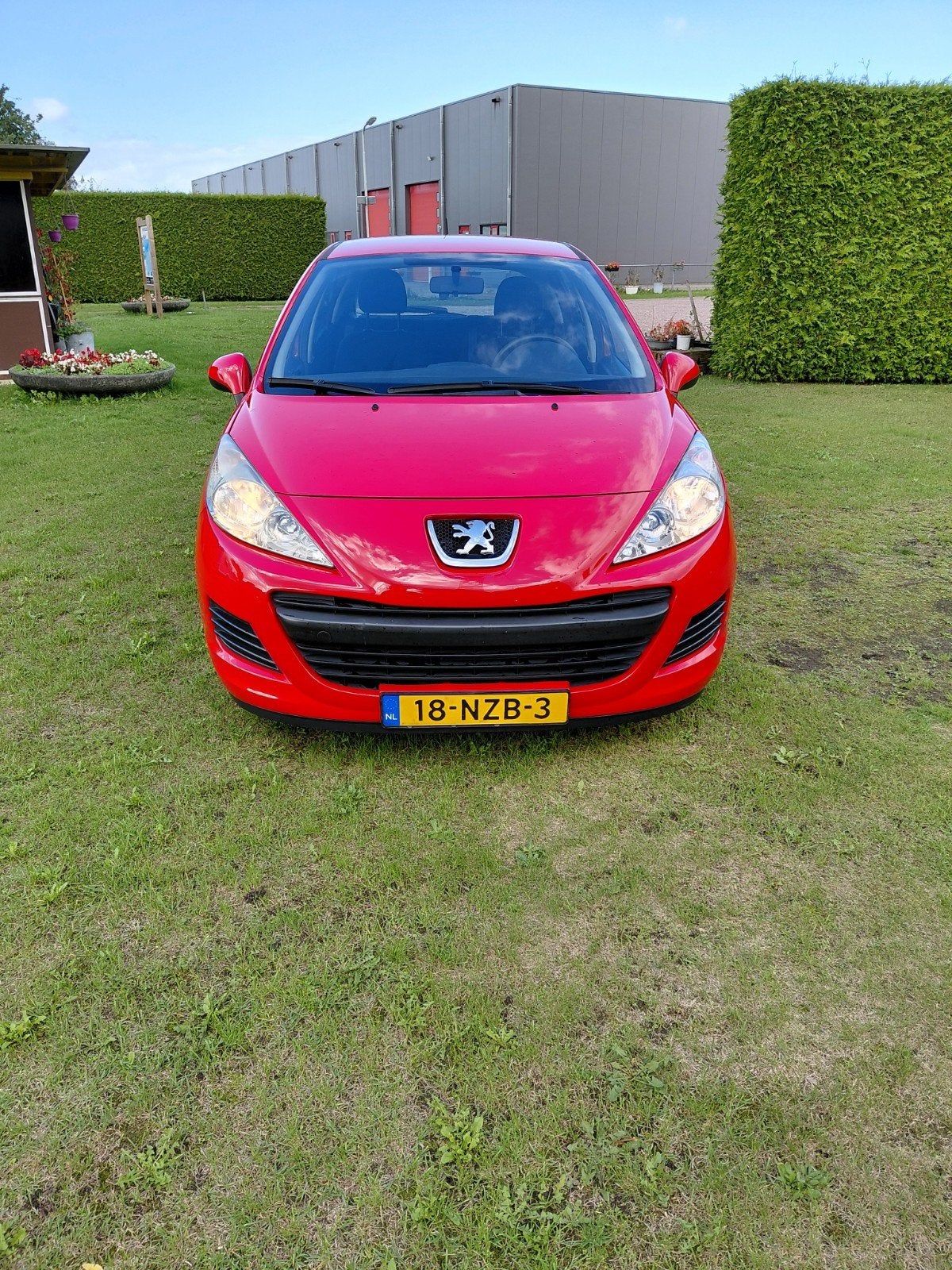 Peugeot 207 1.4 5DRS 2011 Rood, Auto's, Voorwielaandrijving, 4 cilinders, 49 €/maand, Origineel Nederlands