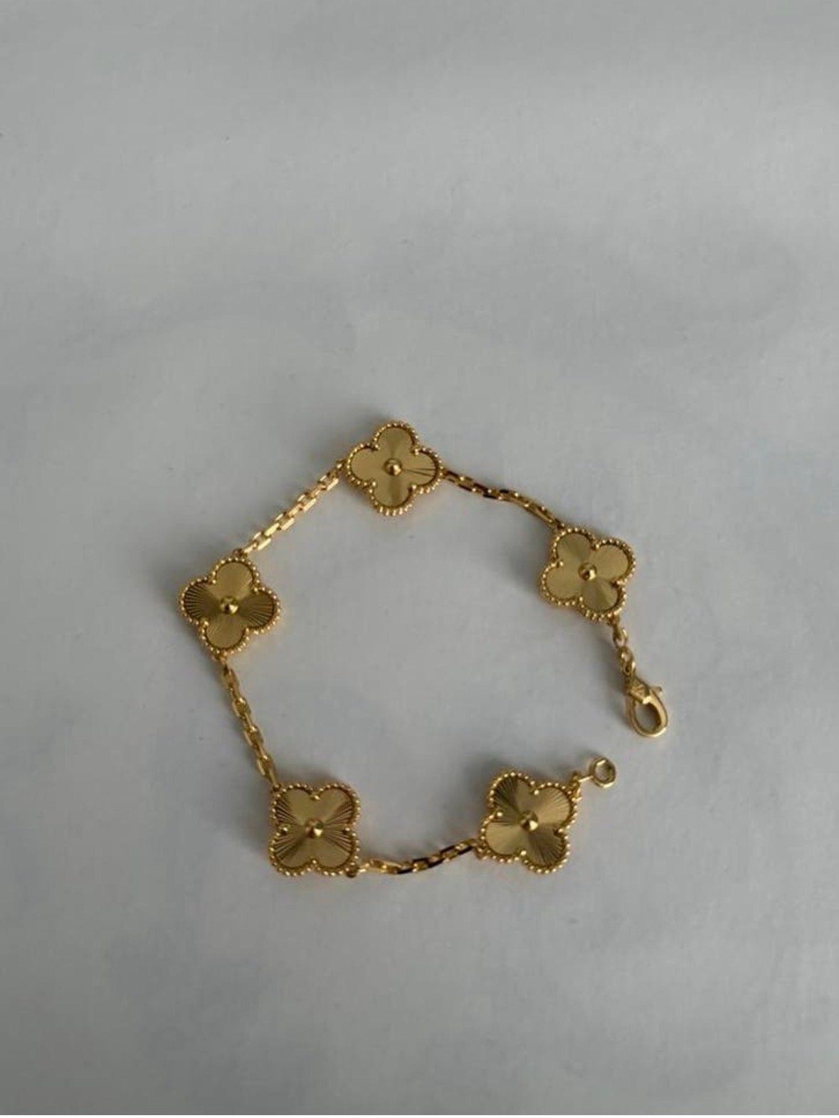 Gouden klavertje vier armband, Ophalen of Verzenden, Nieuw, Goud
