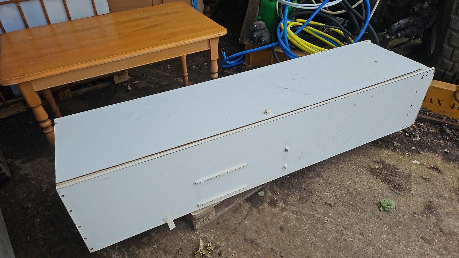 Houten werkplaatskast, Ophalen