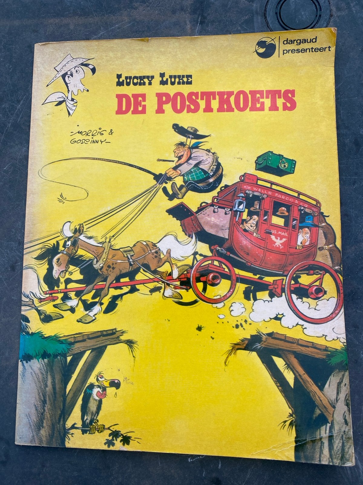 Lucky Luke - De Postkoets (Morris & Goscinny), Boeken, Eén stripboek, Ophalen, Gelezen