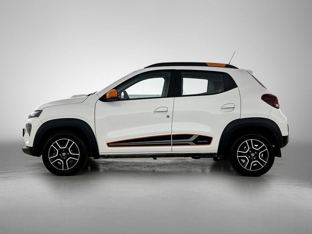 Dacia Spring Comfort Plus (Orange Pack) 27 kWh | Achteruitri, Auto's, 12 maanden, Gebruikt, Leder en Stof, Wit