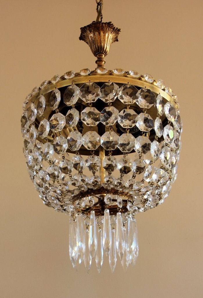 Messing kroonluchtertje met diamantstrengen, Ophalen