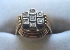 14 Karaat met certificaad de   Gouden Ring met 7 Briljant Ge, Ophalen of Verzenden
