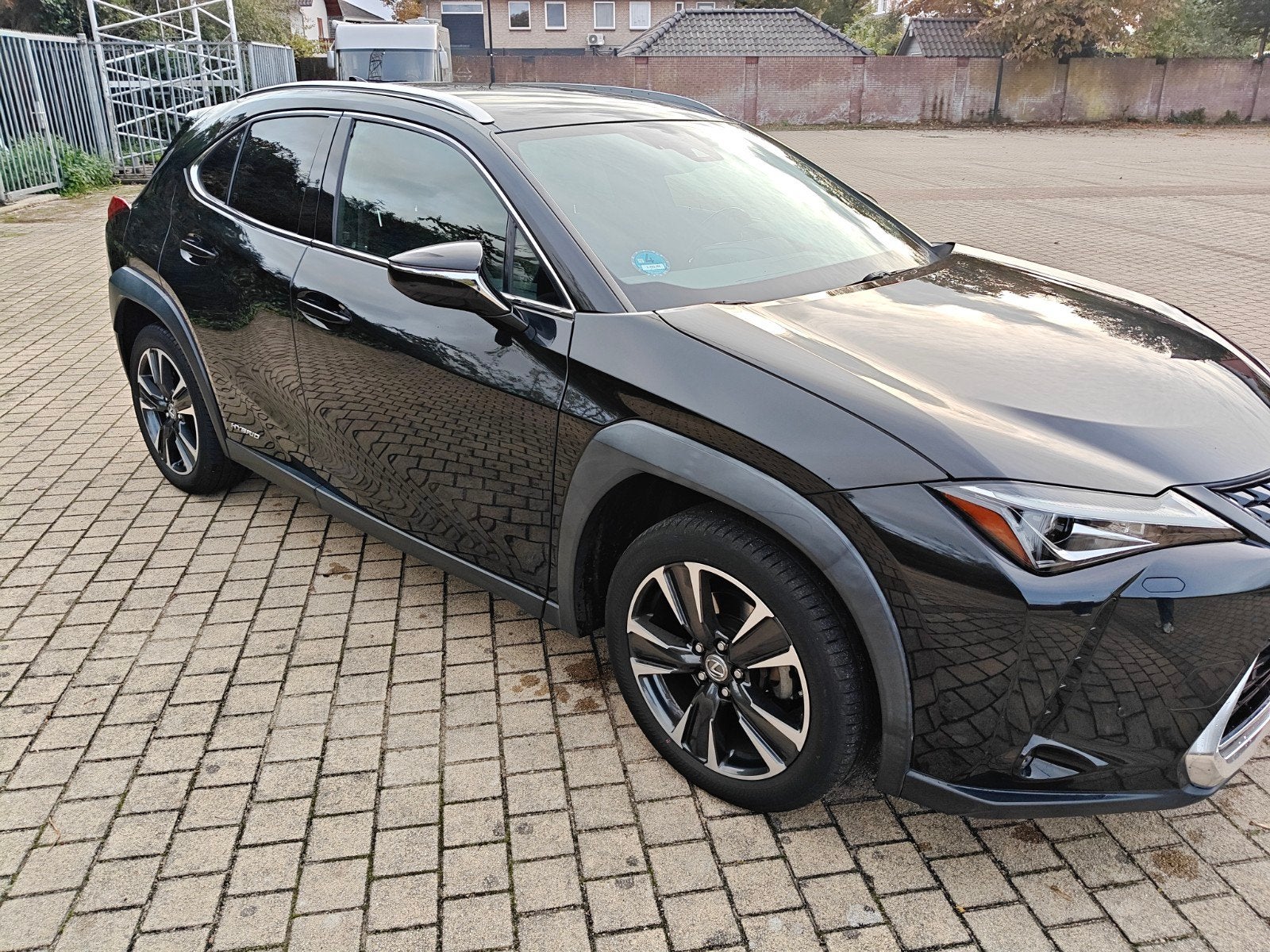 Lexus UX 250h Hybrid 184pk CVT 2019 Zwart, Auto's, Verwarmde buitenspiegels, Alcantara, Zwart, 152 pk