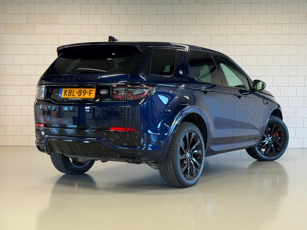 Land Rover DISCOVERY SPORT P300e 1.5 R-Dynamic Black Pack HS, Auto's, Land Rover, 309 pk, Blauw, Discovery Sport, Leder