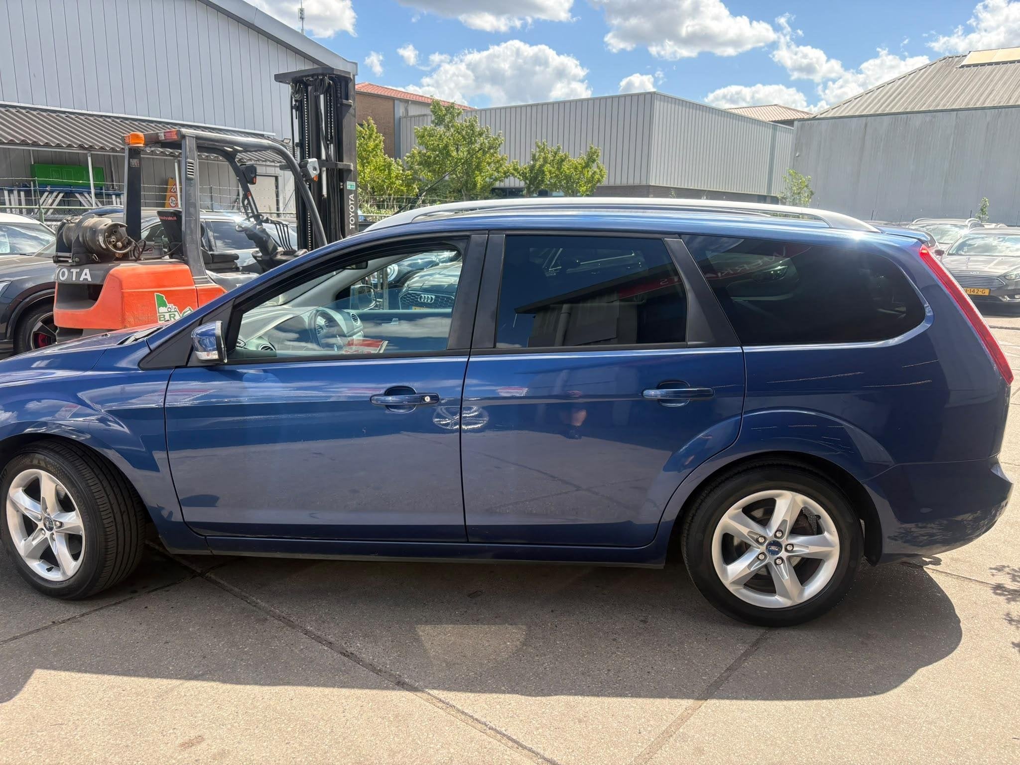 Ford Focus Wagon 1.8 Limited Flexi Fuel Airco, cruise, trekh, Gebruikt, 4 cilinders, Blauw, Parkeersensor