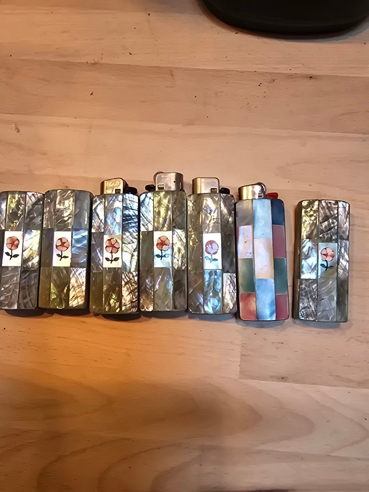 7 hulzen voor wegwerp aanstekers, Ophalen of Verzenden, Zo goed als nieuw, Aansteker