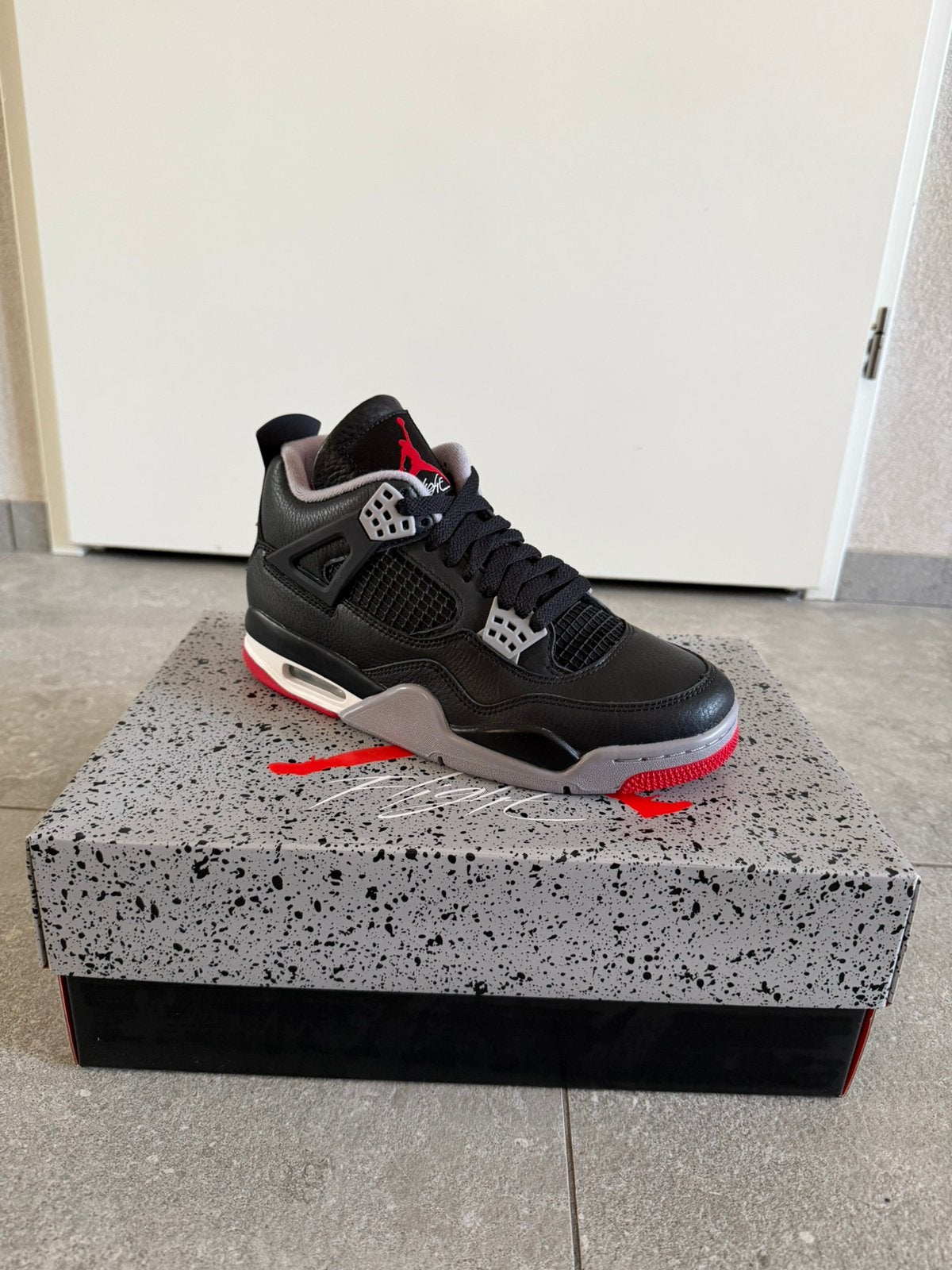 Nike Air Jordan 4 Retro Bred Reimagined - Maat 40 -Deadstock, Kleding | Heren, Ophalen of Verzenden, Zo goed als nieuw, Zwart