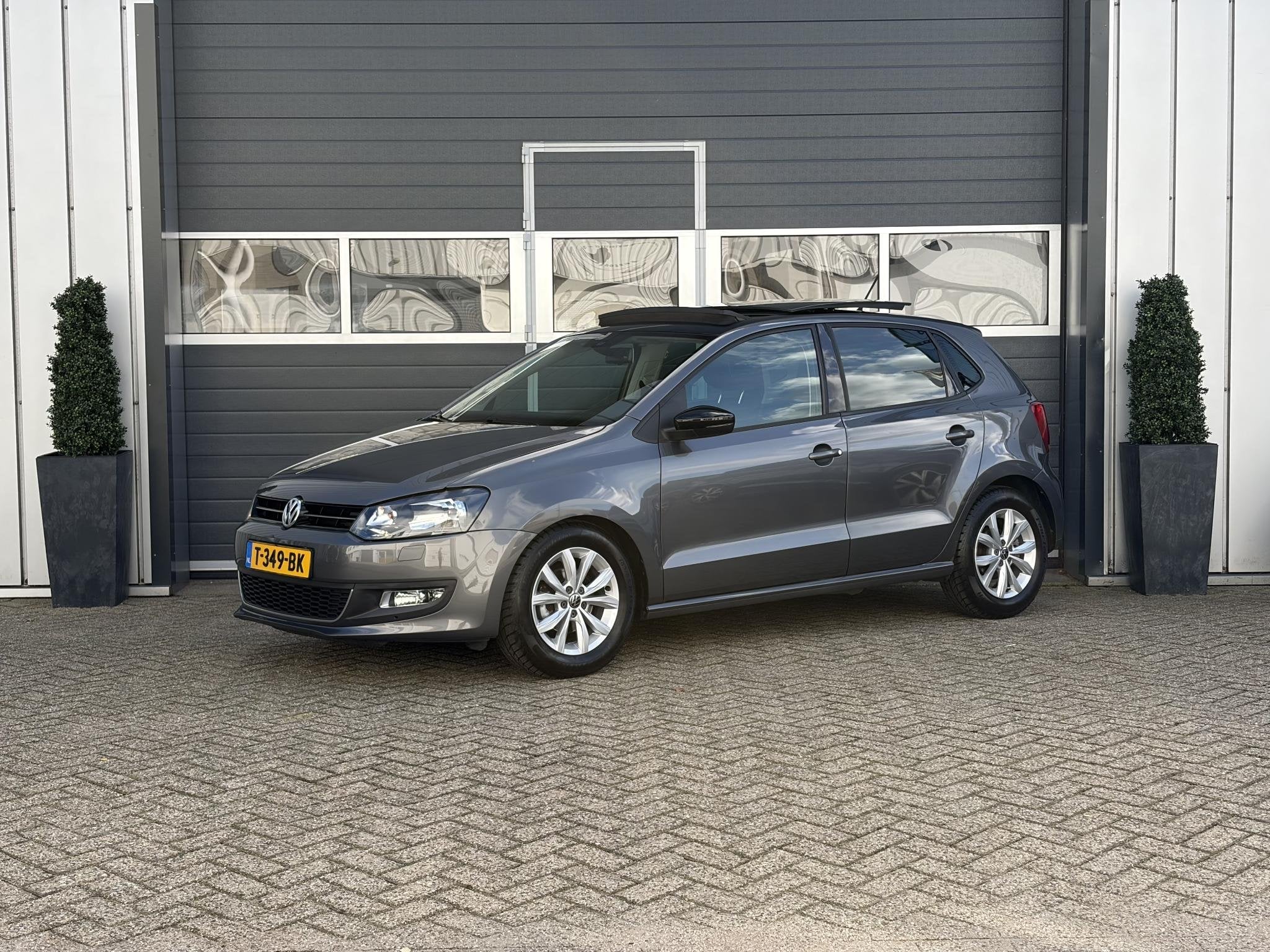 Volkswagen Polo 1.2 TSI Highline | Pano | Stoelverwarming |, Voorwielaandrijving, Euro 5, Stof, Zwart