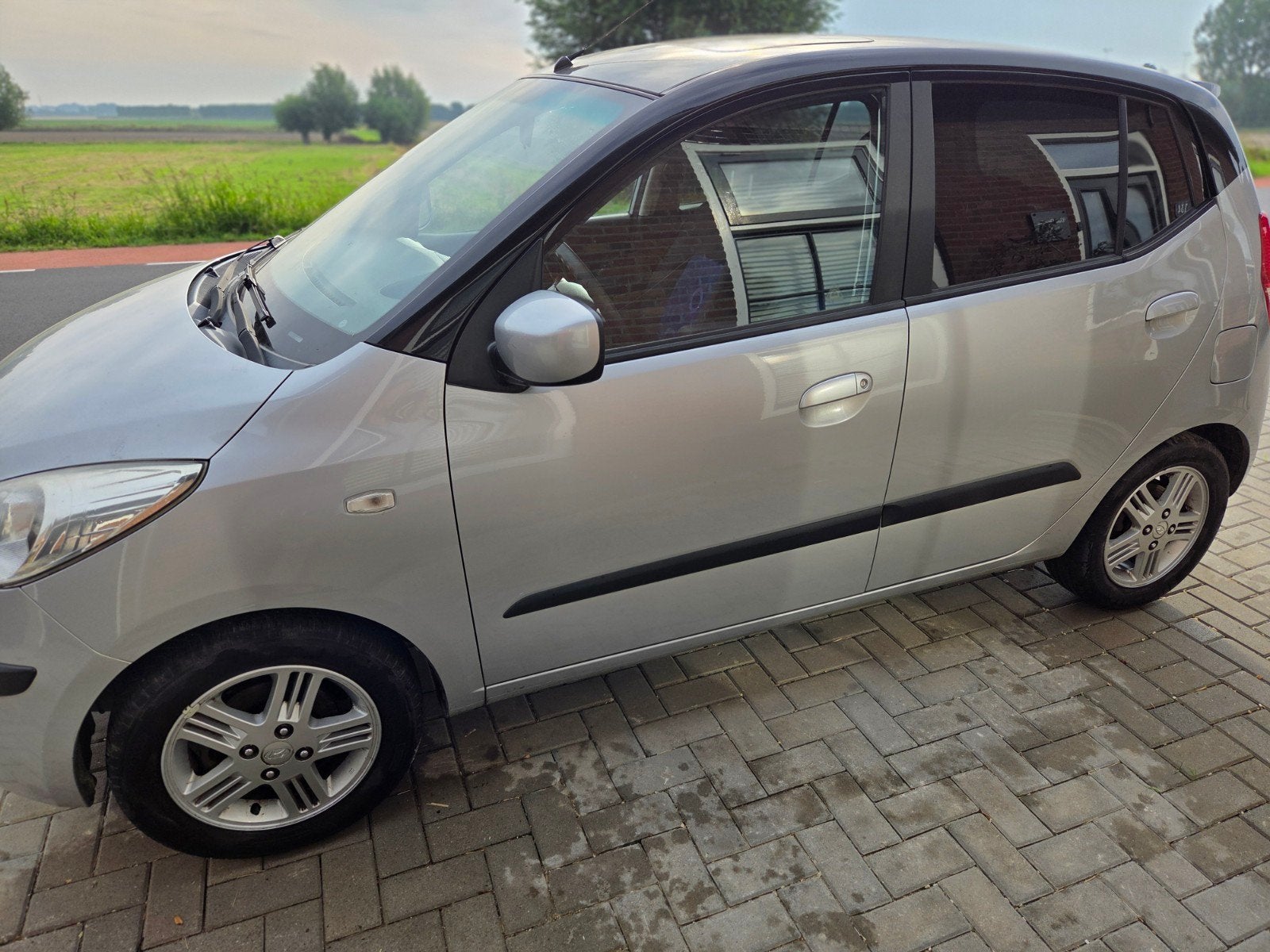 Hyundai i10 5 deurs automaat, Auto's, Automaat, Stof, Zwart, Particulier