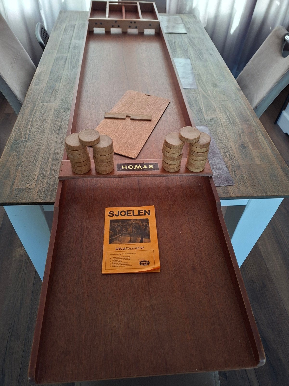 Homassjoelbak S-40 met spelreglement en schijven, Vijf spelers of meer, Ophalen, Gebruikt, Homas Spelen
