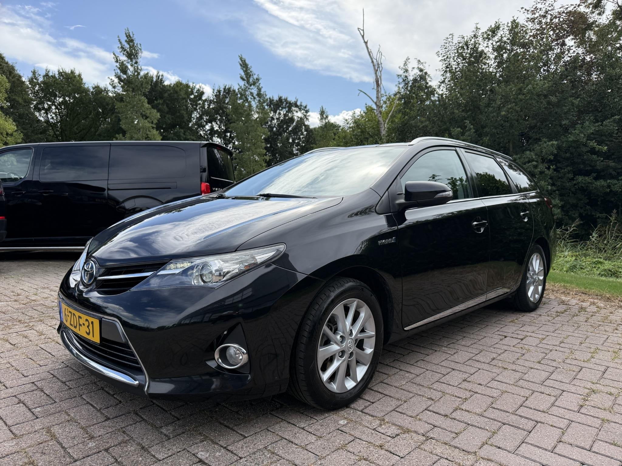 Toyota Auris Touring Sports 1.8 Hybrid Lease 136PK | Climate, Auto's, Gebruikt, Euro 6, Zwart, Origineel Nederlands