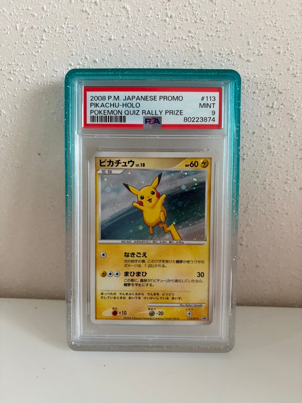 Pikachu 113 psa 9, Ophalen of Verzenden, Zo goed als nieuw