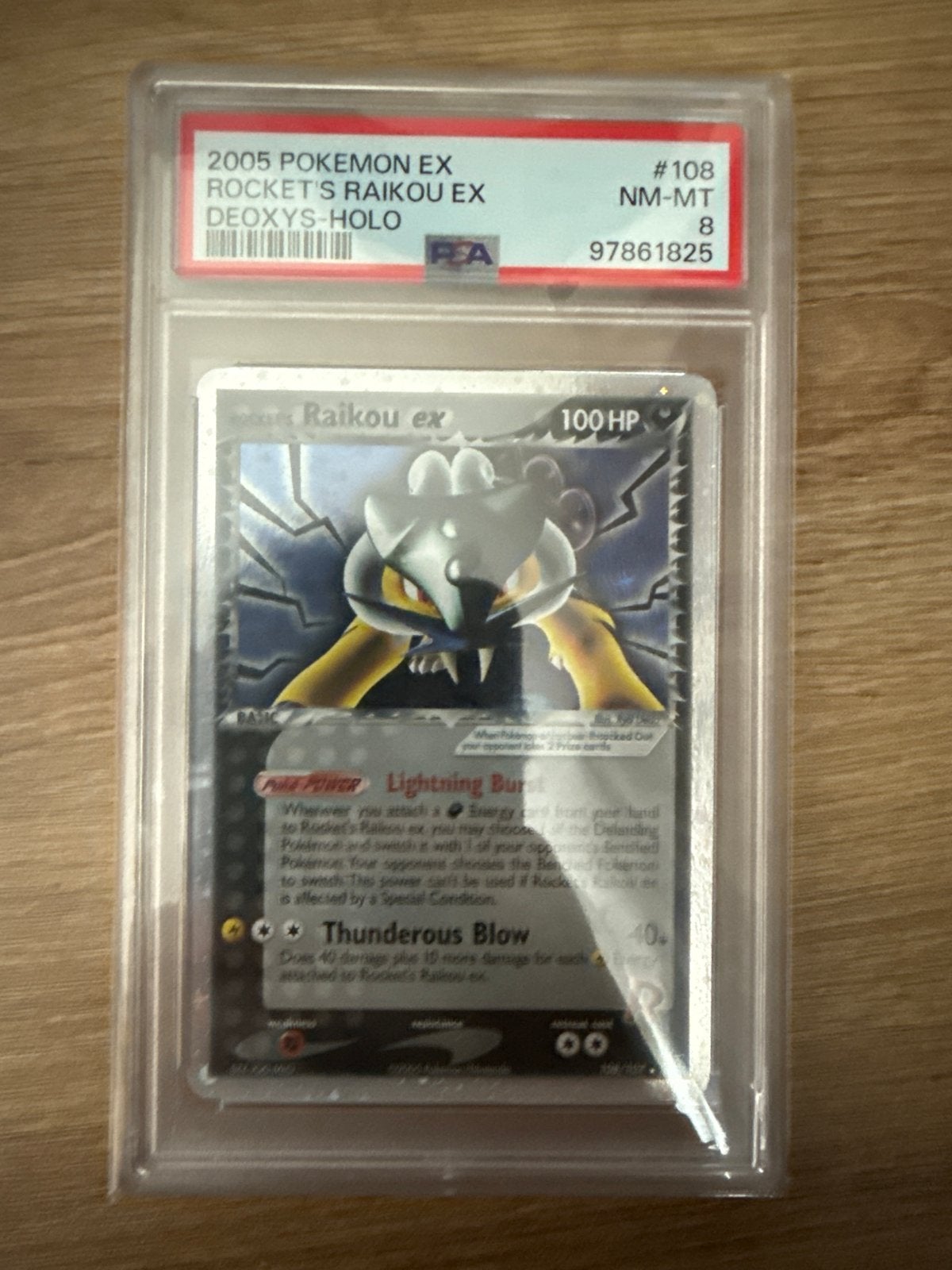 Pokemon | Rocket's Raikou EX Deoxys-Holo PSA 8, Ophalen of Verzenden, Zo goed als nieuw, Losse kaart, Foil