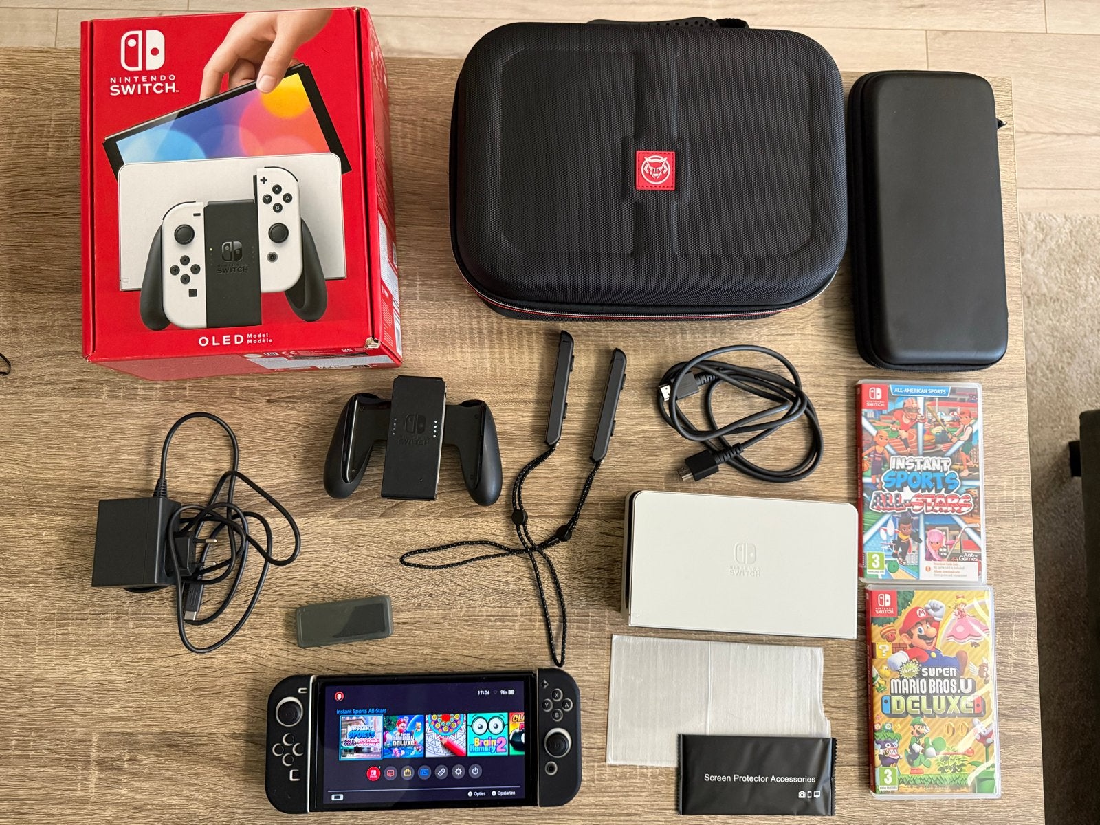 Nintendo Switch OLED met games en accessoires, Met games, Met 2 controllers, Zo goed als nieuw, Switch OLED