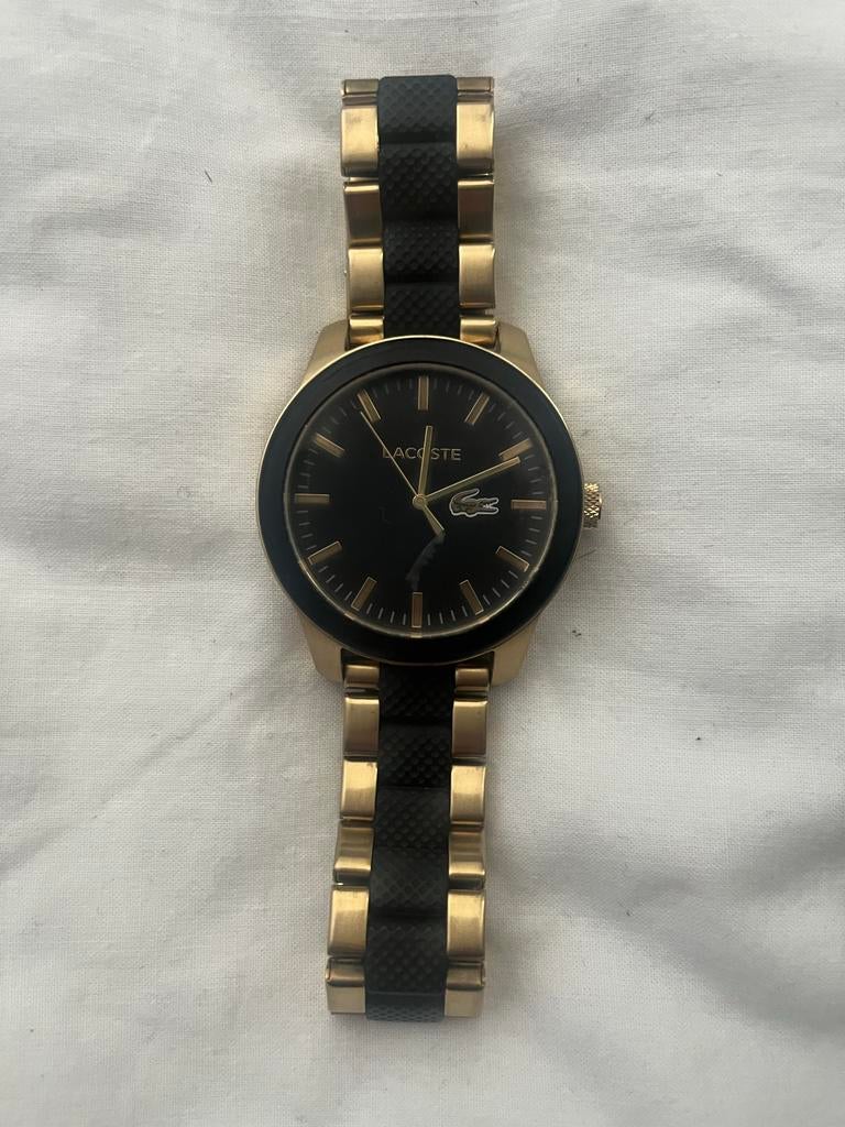 Lacoste horloge met klein krasje op glas, Sieraden, Tassen en Uiterlijk, Horloges | Heren, Overige merken, Gebruikt, Staal, Polshorloge