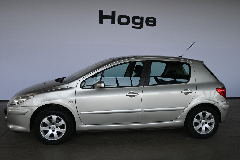 Peugeot 307 1.4-16V Premium Clima Cruise Control Trekhaak Ni, Auto's, Peugeot, Voorwielaandrijving, Zwart, 4 cilinders, 620 kg