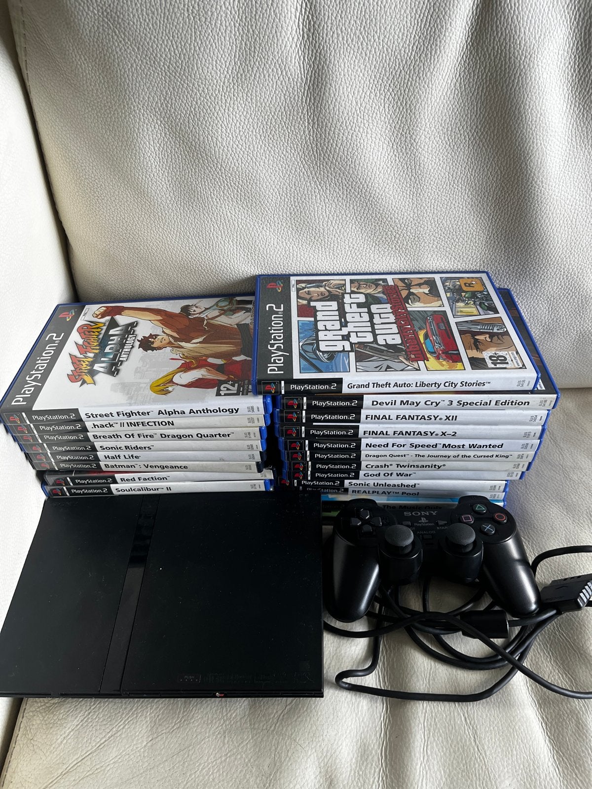 PlayStation 2 Slim compleet met Games en 1 controller, Spelcomputers en Games, Gebruikt, Overige genres, 2 spelers, Eén computer