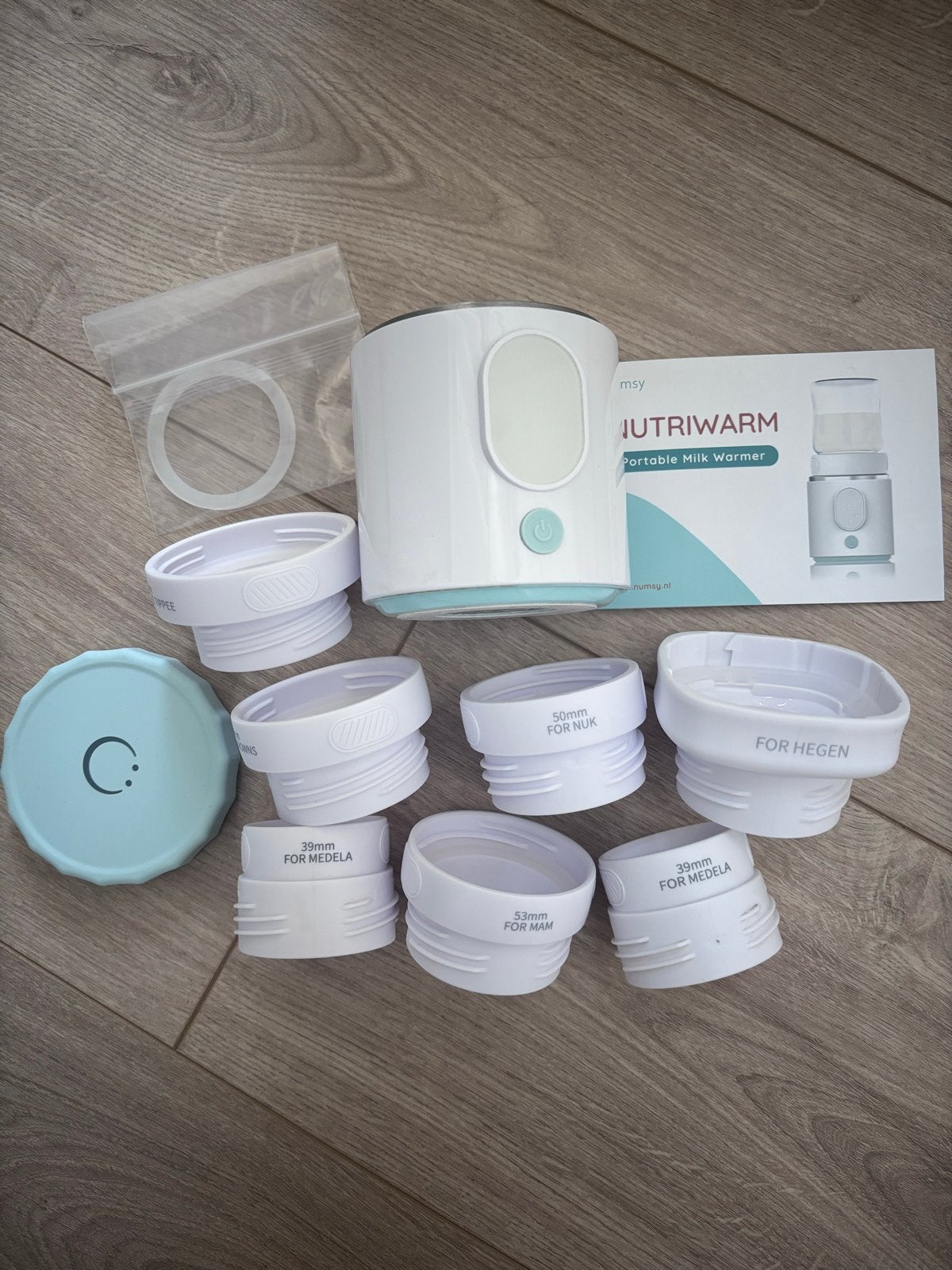 Numsy Nutriwarm Draagbare Flessenwarmer - Diverse Adapters, Nieuw, Ophalen of Verzenden, Draagbaar, Flessen- of potjesverwarmer