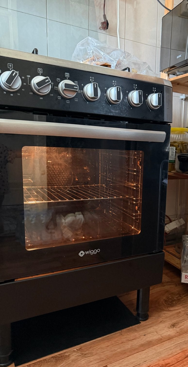 Wiggo Vrijstaand Gasfornuis met Oven - Zwart, Ophalen, Hete lucht, 4 kookzones, Zo goed als nieuw
