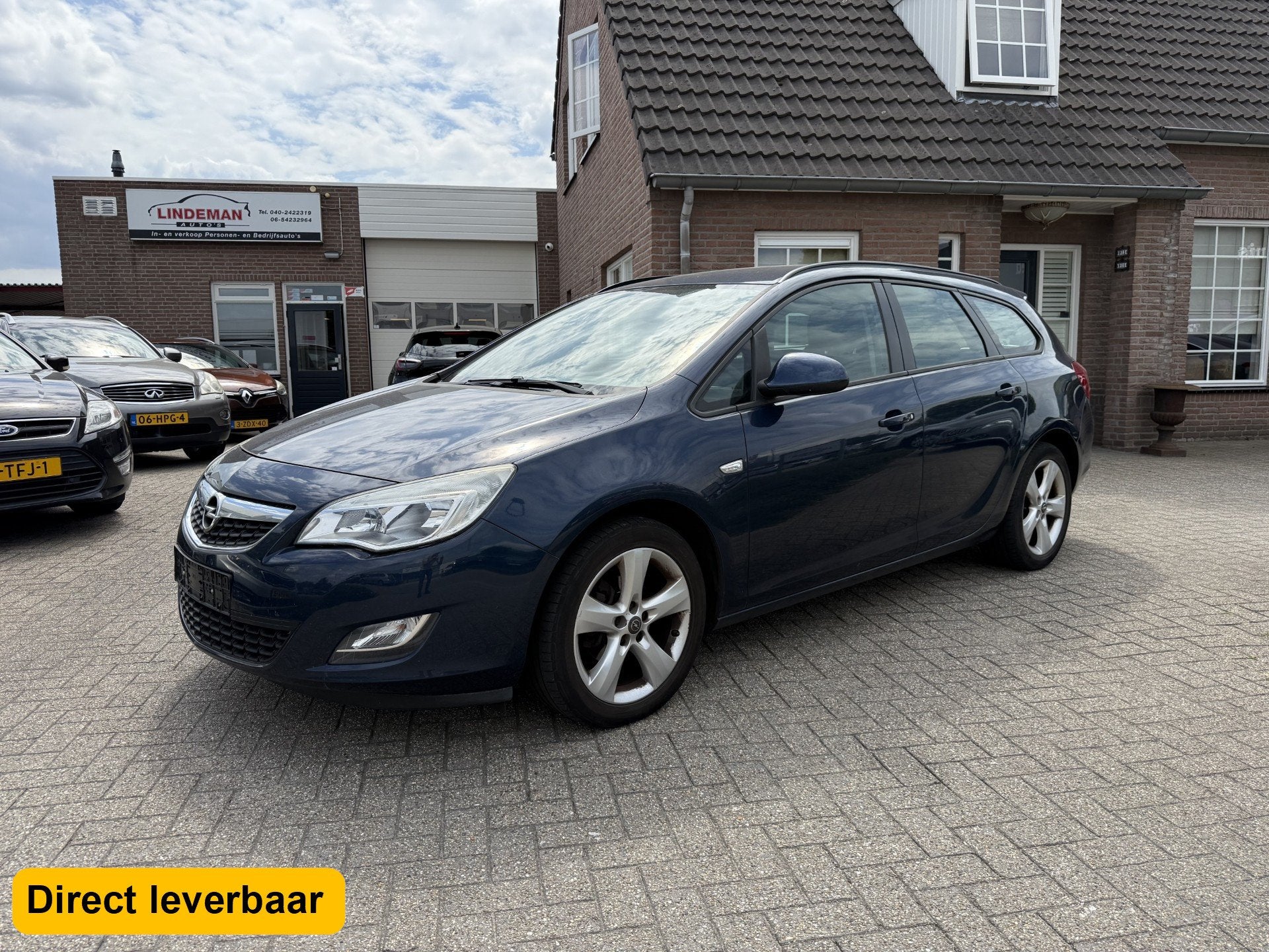 Opel Astra Sports Tourer 1.4 Turbo Edition Airco Navigatie, Auto's, Voorwielaandrijving, Euro 5, Stof, Gebruikt