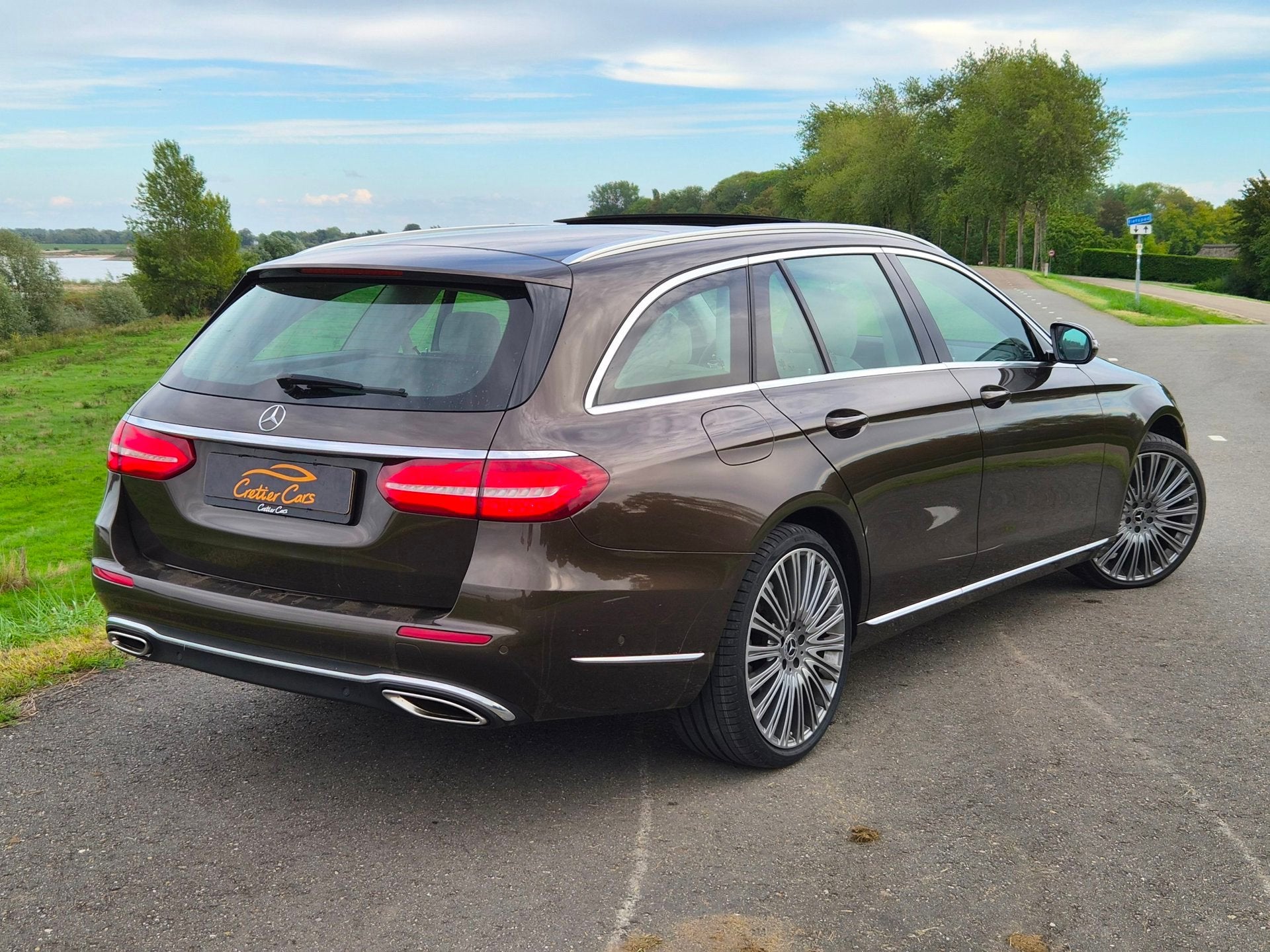 Mercedes-Benz E-klasse Estate 400 4MATIC Premium Plus Luxury, Auto's, Automaat, Dealer onderhouden, Gebruikt, Bruin