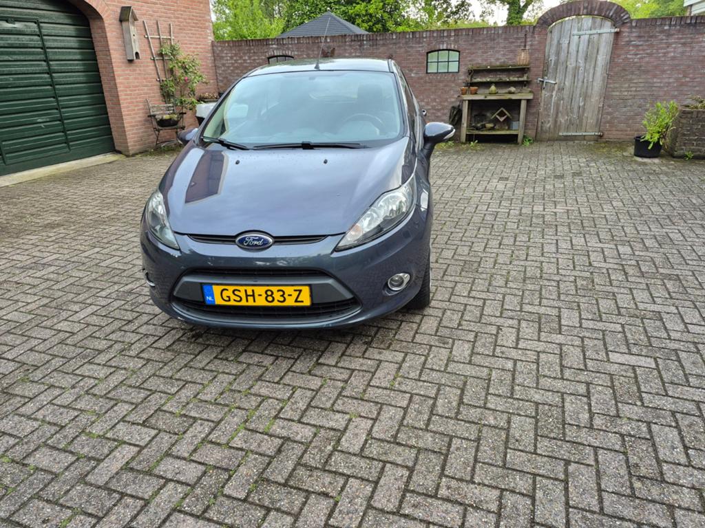 Ford Fiësta 1.25 60KW 5DR 2012 Grijs, Voorwielaandrijving, Stof, 600 kg, Handgeschakeld