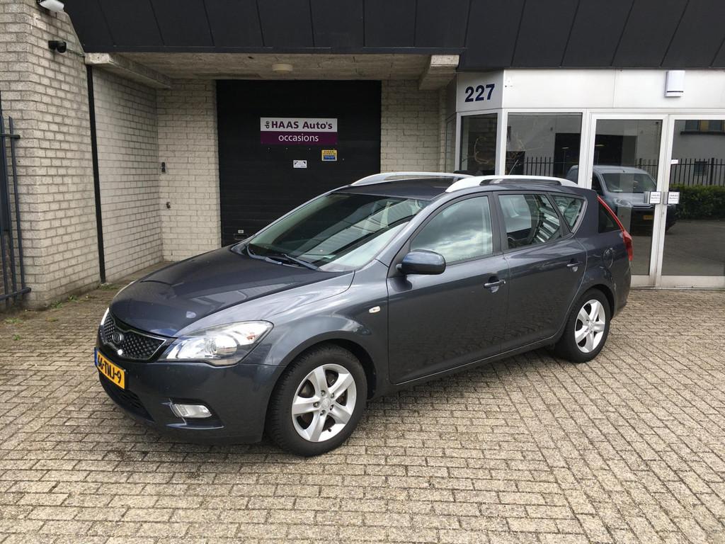 Kia Cee'd Sporty Wagon 1.4 CVVT Navigator Plus Pack / CLIMAT, Voorwielaandrijving, Euro 5, Stof, Zwart