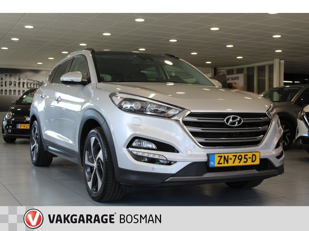 Hyundai Tucson 1.6 T-GDi Premium/LEDER/PANO/TREKHAAK, Auto's, Keurmerk '100% Onderhouden', Dealer onderhouden, 4 cilinders, Handgeschakeld