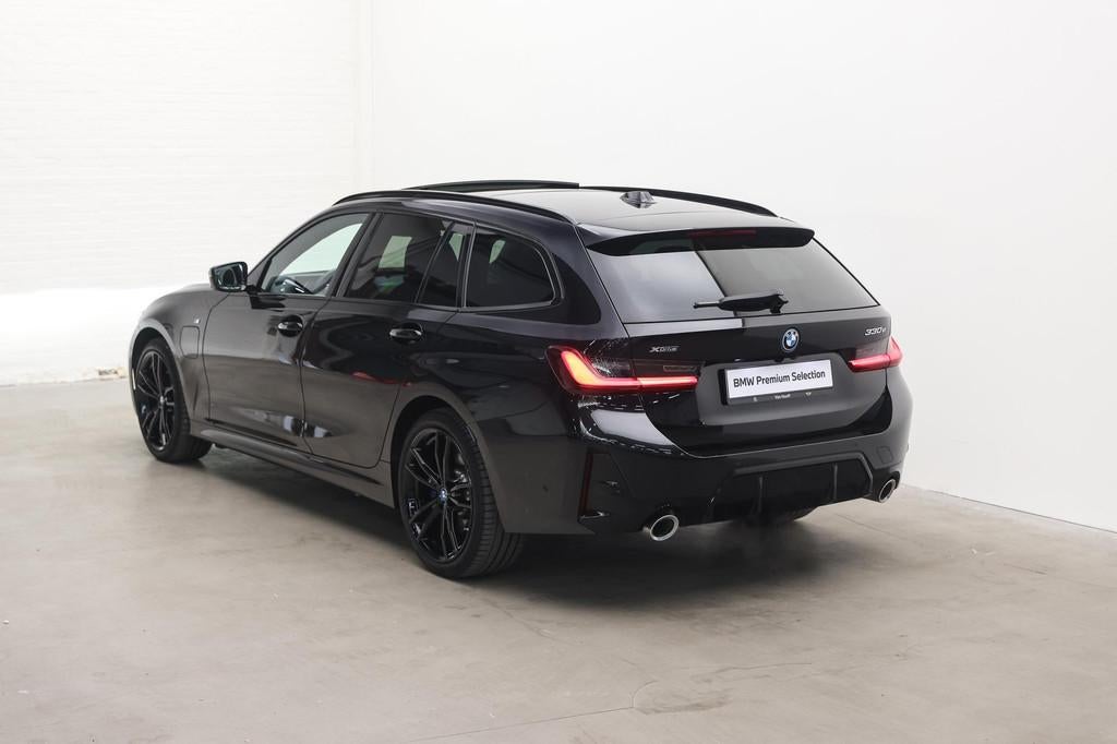 BMW 3 Serie Touring 330e xDrive High Executive M Sport Autom, 1998 cc, Stof, Zwart, 4 cilinders