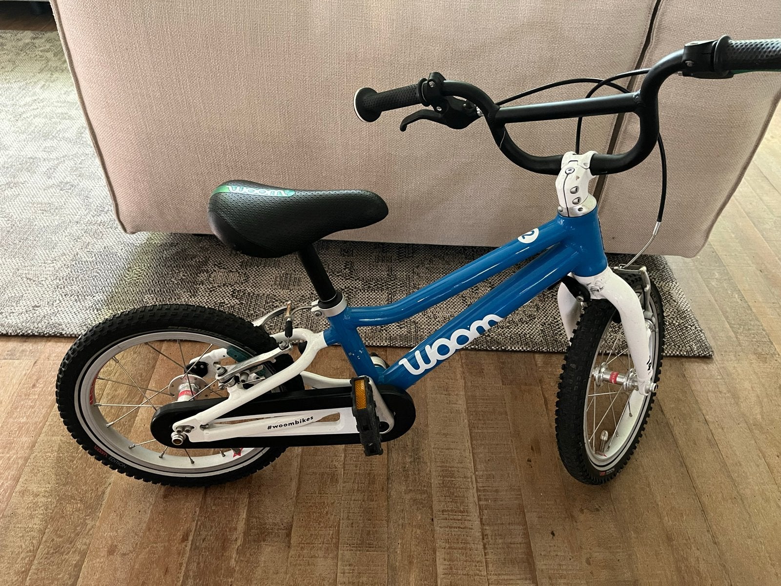 Woom 2 kinderfiets - 14 inch - Blauw, Ophalen of Verzenden, Gebruikt, Velgrem, 16 tot 20 inch