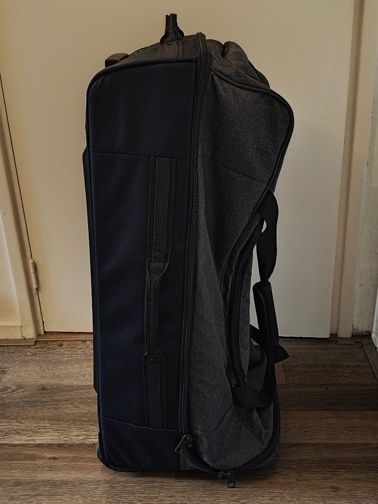 reistas met wieltjes. 105 liter, 30 cm of meer, Gebruikt, Blauw, 60 tot 80 cm