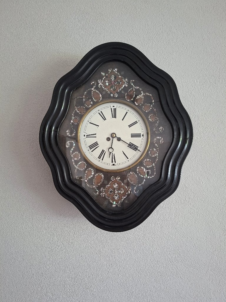 Antieke klok oeil de boeuf, Ophalen