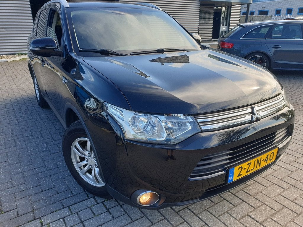 Mitsubishi Outlander 2.0 PHEV Business Edition X-Line4x4 Hyb, Auto's, Mitsubishi, 4 cilinders, Zwart, Bedrijf, Hybride Elektrisch/Benzine