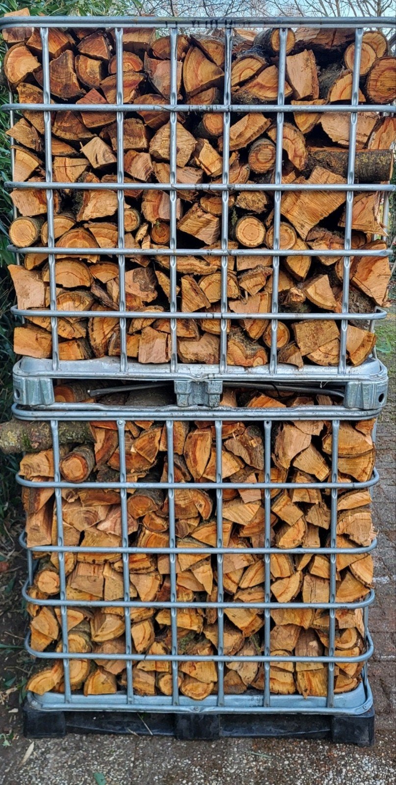 Gekloofd haardhout in IBC-container Prunes/kersenhout, Tuin en Terras, Haardhout, Minder dan 3 m³, Ophalen of Verzenden, Overige houtsoorten