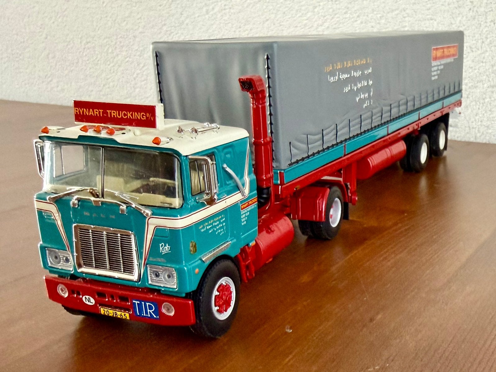 WSI Rynart Trucking, Mack F700 + 2-axle Classic Curtain Side, Ophalen of Verzenden, Zo goed als nieuw, Bus of Vrachtwagen, Wsi