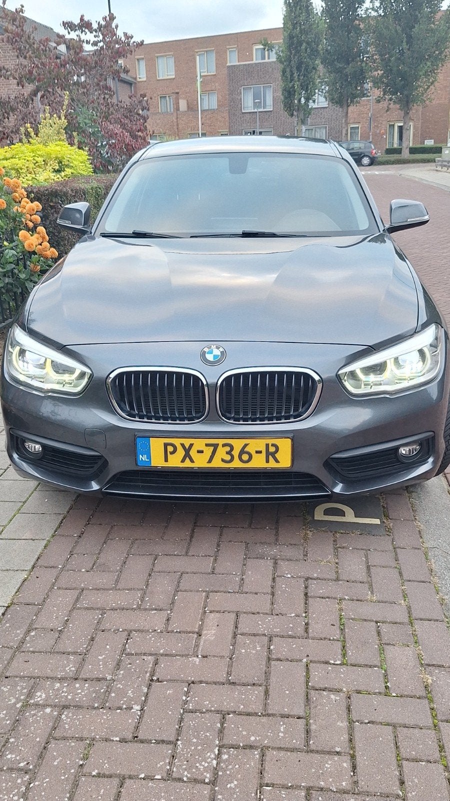 BMW 1-Serie 118i 136pk Aut 2017 Grijs, Dealer onderhouden, 1295 kg, Navigatiesysteem, Origineel Nederlands