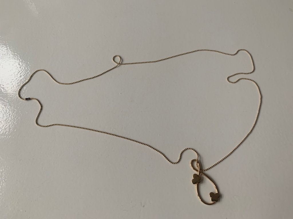 Goudvergulde lange ketting met symbool en vlinders, Met hanger, Nieuw, Ophalen of Verzenden, Goud