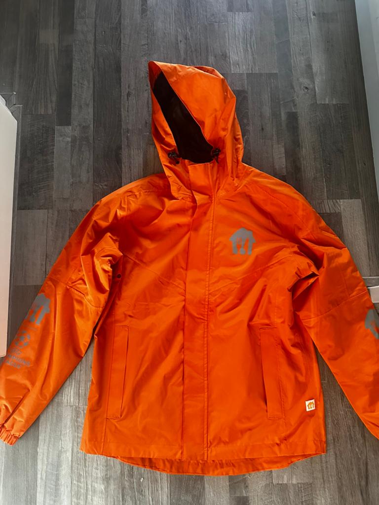 Thuisbezorgd Jas, Regenjas, Kleding | Heren, Ophalen of Verzenden, Zo goed als nieuw, Maat 48/50 (M), Oranje
