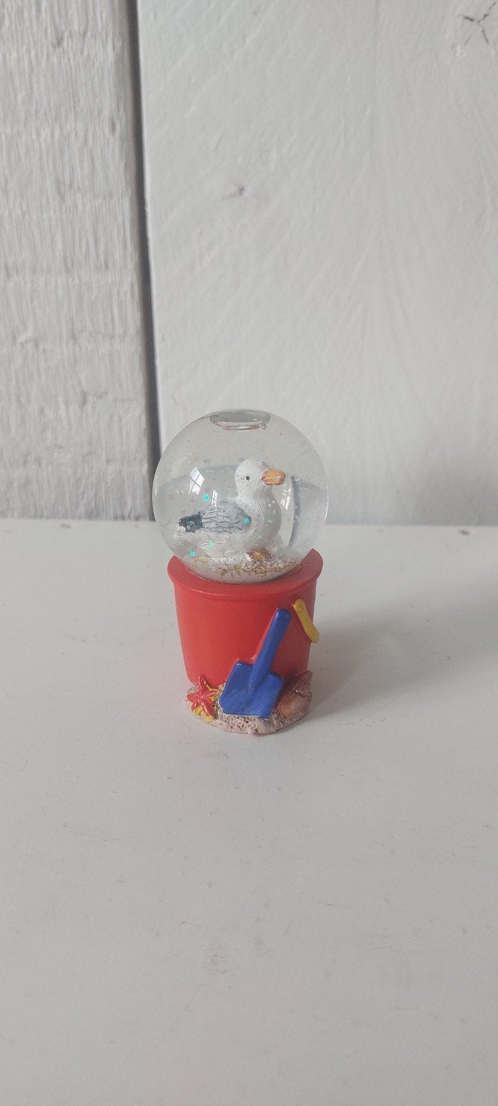 schudbol strand sneeuwbol kust meeuw emmer met scheo, Ophalen of Verzenden