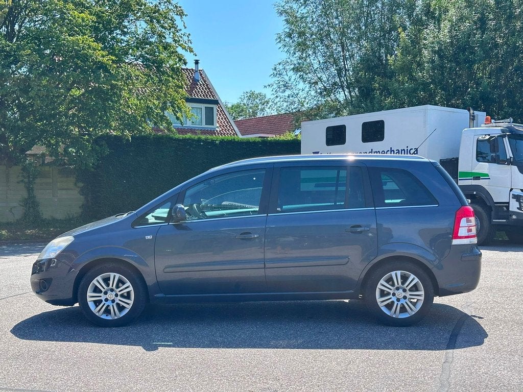 Opel Zafira 1.8 Cosmo Automaat*Cruise*Trekhaak*Clima*LM vlge, Auto's, Gebruikt, 4 cilinders, Blauw, Zafira