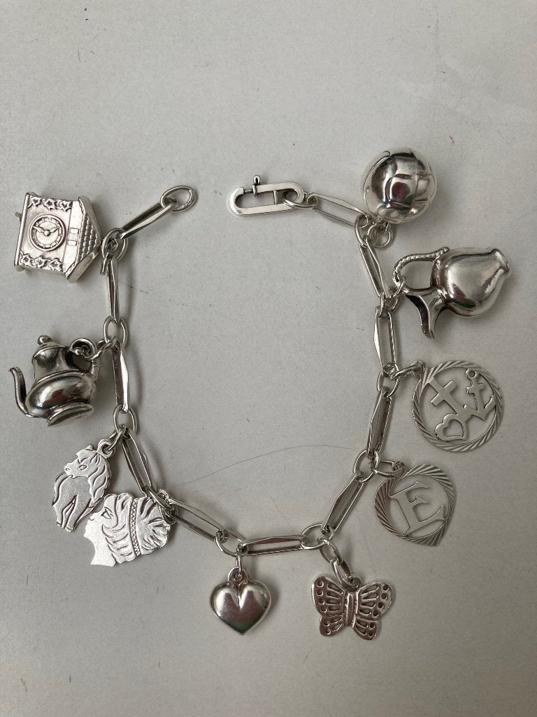 Zilveren bedelarmband (835) + 10 bedels (835+925) vintage, Ophalen, Zo goed als nieuw, Met bedels of kralen, Zilver