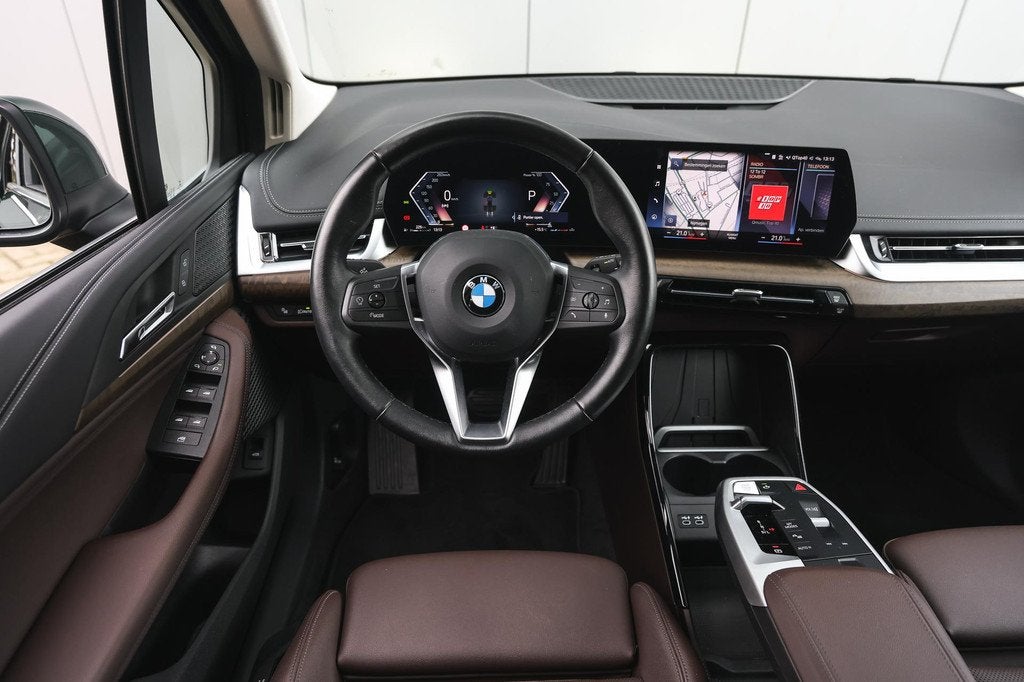BMW 2 Serie Active Tourer 220i Luxury Line Automaat / Panora, Auto's, BMW, 12 maanden, Stof, Gebruikt, Euro 6