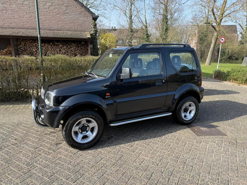 Suzuki Jimny 1.3 4WD Airco/trekhaak/carplay/Stoelverwarming, Stof, 40 €/maand, Zwart, 4 stoelen