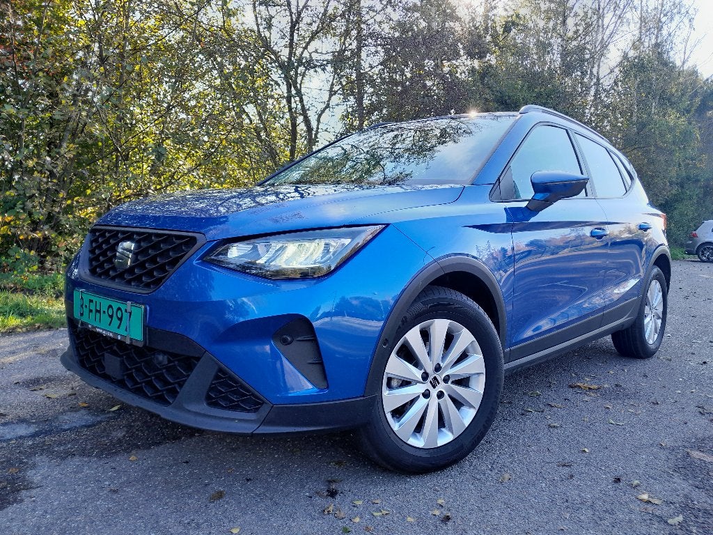Seat Arona 1.0 TSI 115pk Dsg-7 navi,cam,1 jr.gar., Stof, Met garantie (alle), Blauw, 610 kg