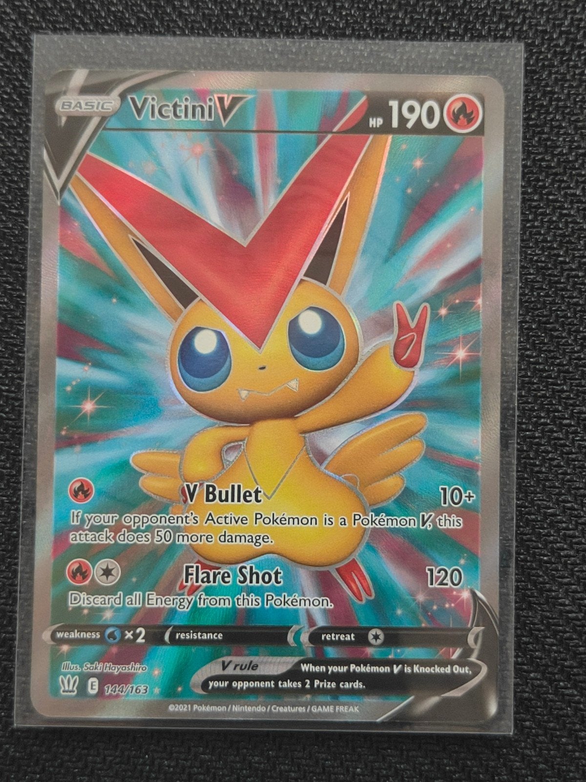 Victini V Full Art BST 144/163 Pokémon Kaart NM, Ophalen of Verzenden, Zo goed als nieuw, Losse kaart